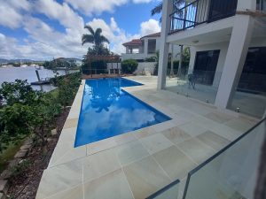 Read more about the article Top Benefits of Choosing Sandstone for Pool Surrounds