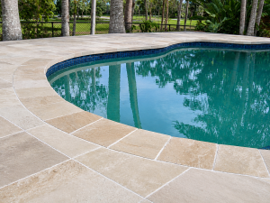 Read more about the article Top Benefits of Choosing Sandstone for Pool Surrounds