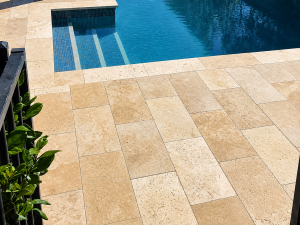 Read more about the article How to Choose Between Sandstone and Travertine for Pool Surrounds 